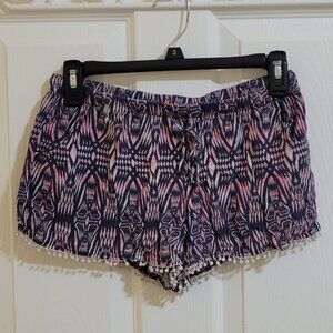 No Boundaries Juniors' blue/pink printed soft shorts with a tassel hem Size S